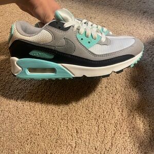 teal, black, grey and white nike air max